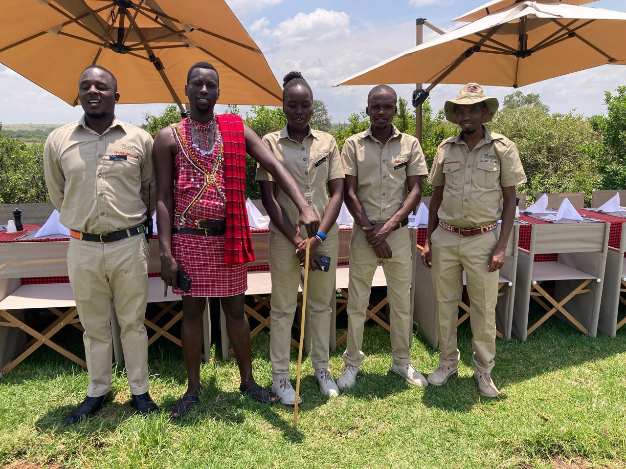 Safari guide with clients on an African game drive